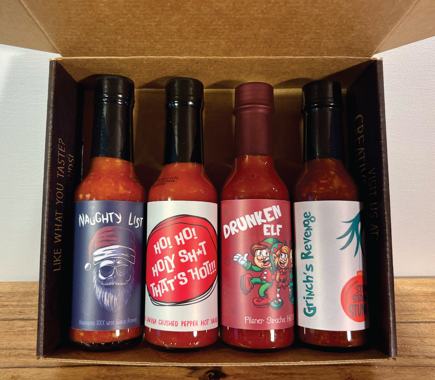 Festive Hot Sauce Collection - Perfect Gift Set for Foodies and Adventurous Eaters including Jalapeno, Siracha, Red Savin and Habanero